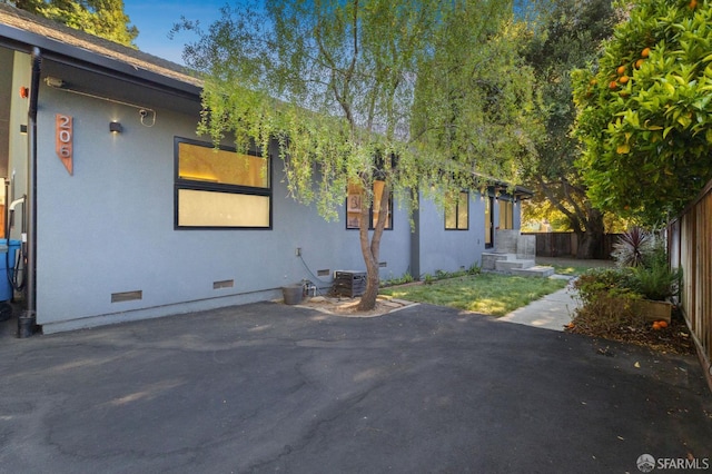 206 Donohoe St, East Palo Alto, CA 94303 - view of side of property featuring crawl space, a patio area, and stucco siding