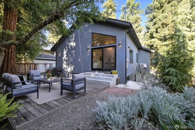206 Donohoe St, East Palo Alto, CA 94303 - rear view of property featuring outdoor lounge area, stucco siding, and a deck