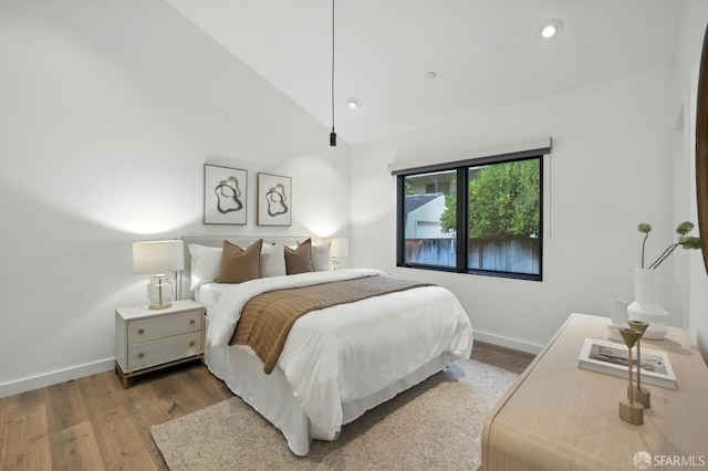 206 Donohoe St, East Palo Alto, CA 94303 - bedroom featuring wood finished floors, high vaulted ceiling, and recessed lighting