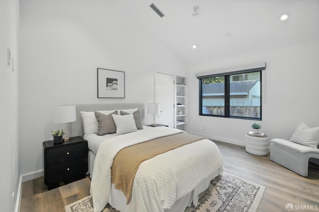 206 Donohoe St, East Palo Alto, CA 94303 - bedroom featuring wood finished floors, high vaulted ceiling, and recessed lighting