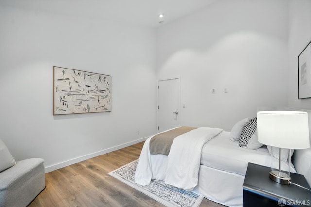 206 Donohoe St, East Palo Alto, CA 94303 - bedroom with wood finished floors and a towering ceiling