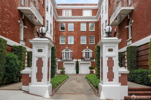 view of building exterior featuring driveway