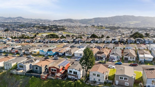 birds eye view of property featuring a residential view and a mountain view