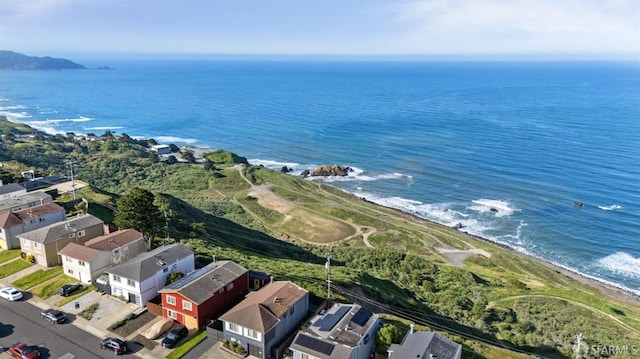 aerial view featuring a residential view and a water view