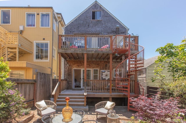 213 Virginia Ave, San Francisco, CA 94110 - back of property with stairway and a wooden deck