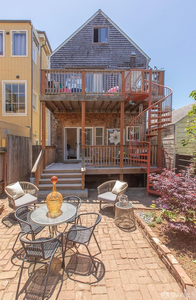 213 Virginia Ave, San Francisco, CA 94110 - rear view of property with a patio area, stairway, and a wooden deck