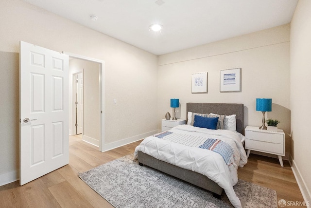 bedroom with light wood-type flooring