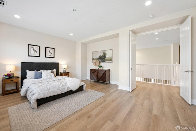 bedroom featuring light wood-type flooring