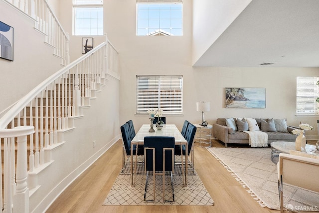 dining area featuring hardwood / wood-style floors