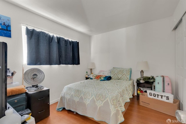 bedroom featuring hardwood / wood-style flooring