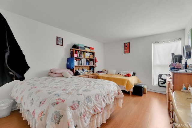 bedroom featuring light wood-type flooring