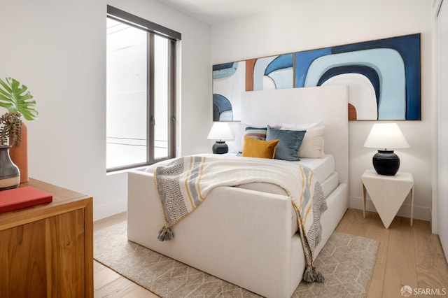 bedroom featuring light hardwood / wood-style flooring