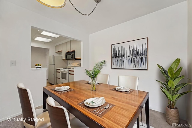 920 Mission Rd Unit 15, South San Francisco, CA 94080 - dining area featuring light carpet and baseboards