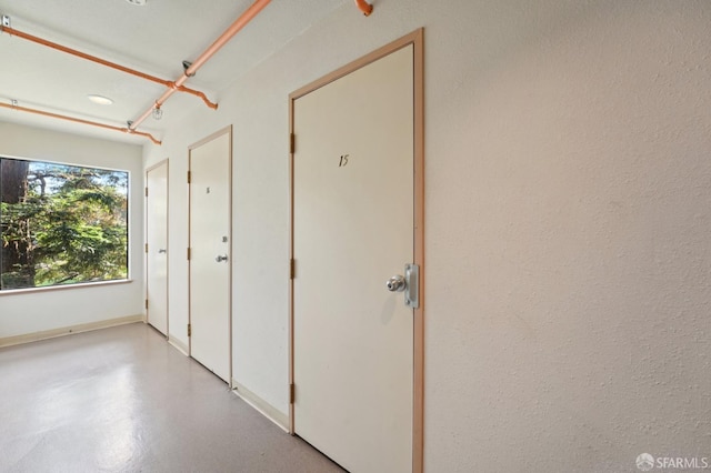 920 Mission Rd Unit 15, South San Francisco, CA 94080 - hallway featuring finished concrete floors