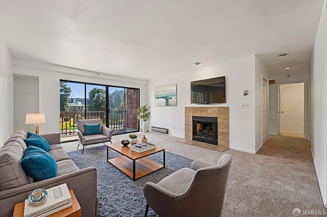 920 Mission Rd Unit 15, South San Francisco, CA 94080 - living room featuring baseboard heating, carpet flooring, and a tile fireplace