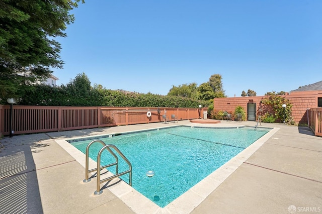 920 Mission Rd Unit 15, South San Francisco, CA 94080 - view of swimming pool with a fenced backyard and a patio area