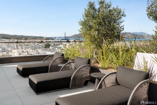 view of patio / terrace with a mountain view