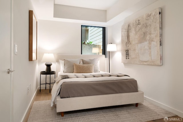 bedroom featuring light wood-type flooring