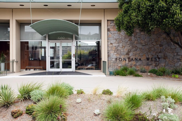 entrance to property featuring french doors