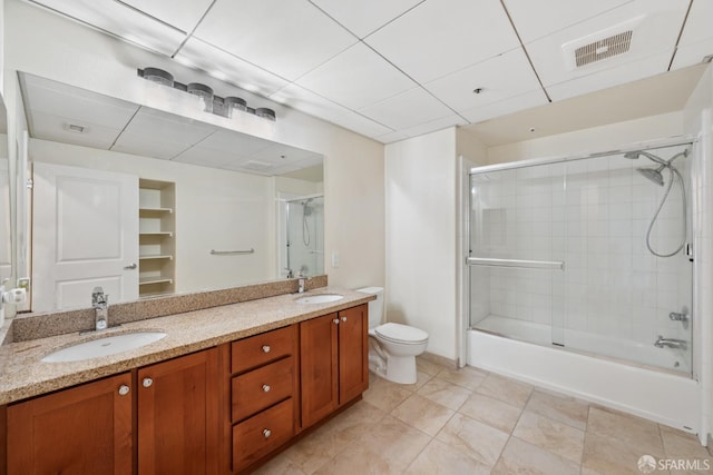 423 7th St Unit 303, Oakland, CA 94607 - full bath featuring double vanity, enclosed tub / shower combo, and tile patterned flooring