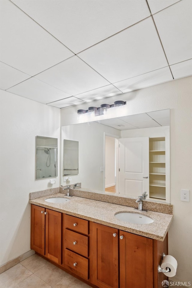 423 7th St Unit 303, Oakland, CA 94607 - bathroom with double vanity and tile patterned flooring
