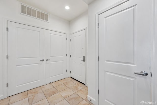 423 7th St Unit 303, Oakland, CA 94607 - entrance foyer featuring recessed lighting and light tile patterned floors