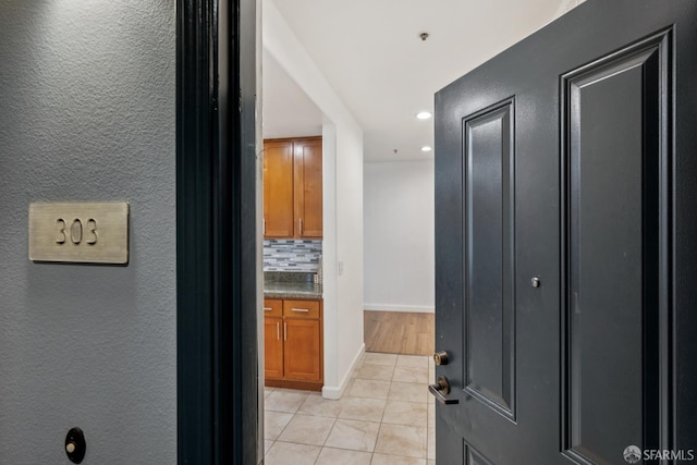 423 7th St Unit 303, Oakland, CA 94607 - corridor featuring light tile patterned flooring, recessed lighting, and a textured wall