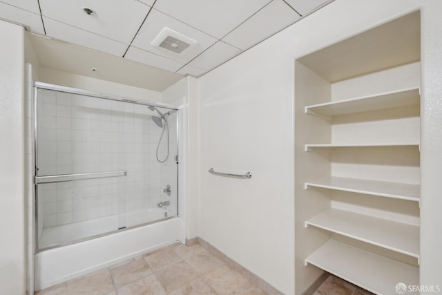 423 7th St Unit 303, Oakland, CA 94607 - full bath with shower / bath combination with glass door and tile patterned floors