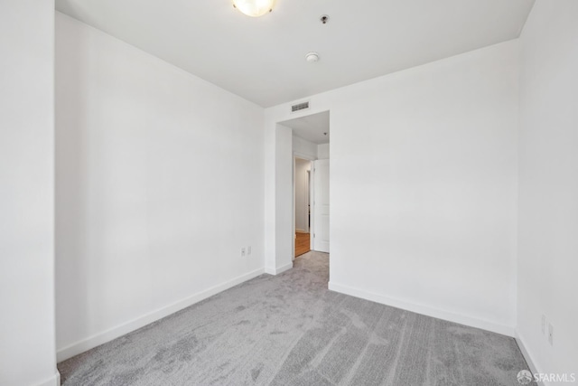 423 7th St Unit 303, Oakland, CA 94607 - unfurnished room with carpet floors and a smoke detector
