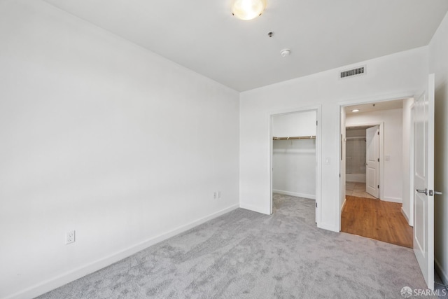 423 7th St Unit 303, Oakland, CA 94607 - unfurnished bedroom with carpet and a spacious closet