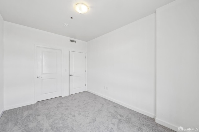 423 7th St Unit 303, Oakland, CA 94607 - carpeted empty room with baseboards