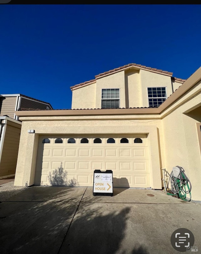 exterior space featuring a garage