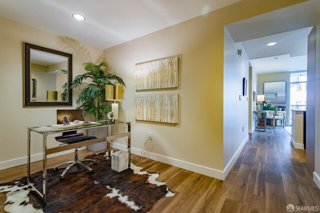 55 Page St Unit 428, San Francisco, CA 94102 - home office with baseboards, wood finished floors, and recessed lighting