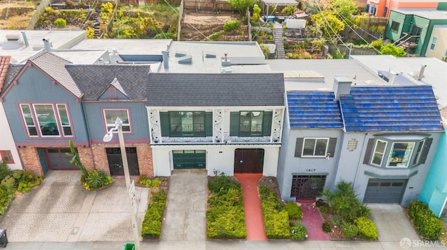 view of front of house featuring driveway and a garage