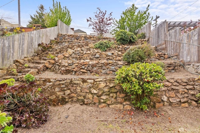 view of yard with fence