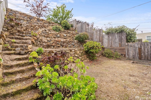view of yard featuring fence