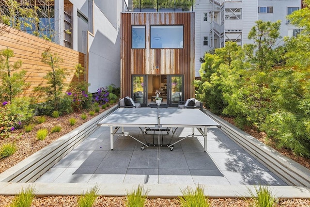 view of patio / terrace with outdoor dining space and fence