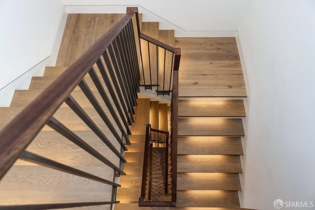 stairway with wooden walls