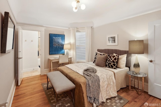 bedroom featuring wood-type flooring