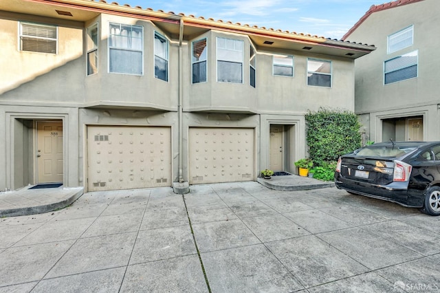 view of property featuring a garage