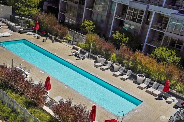 view of pool featuring a patio