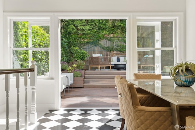 sunroom / solarium with french doors and healthy amount of natural light