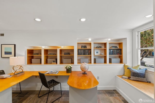 office area featuring built in study area, ornamental molding, recessed lighting, and baseboards