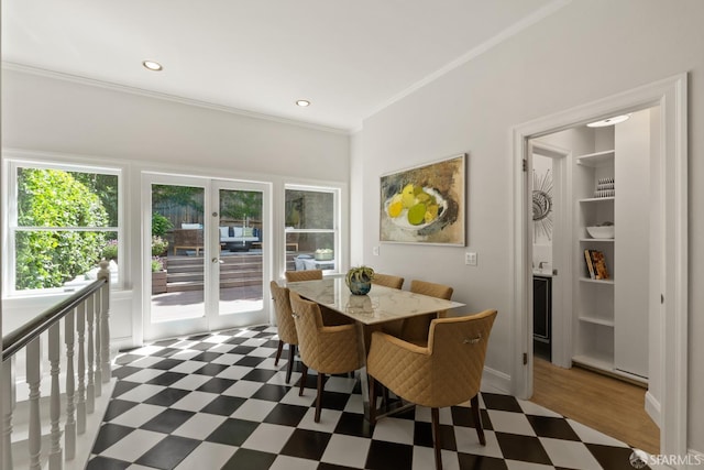 dining area featuring tile patterned floors, crown molding, and recessed lighting