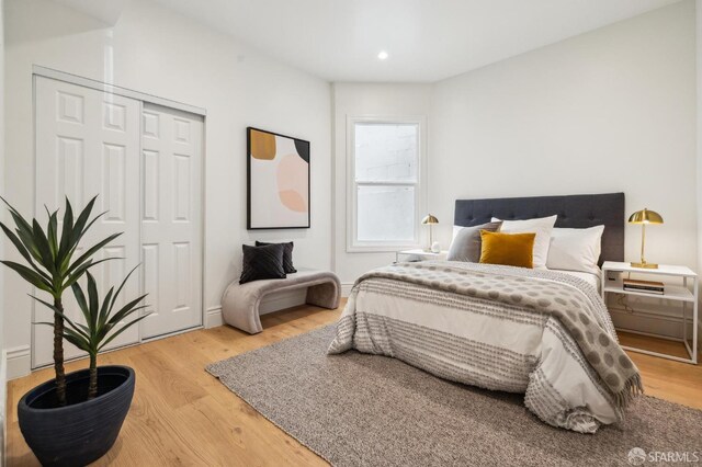 1029 Jackson St Unit 1031, San Francisco, CA 94133 - bedroom with light wood-style flooring, a closet, and recessed lighting