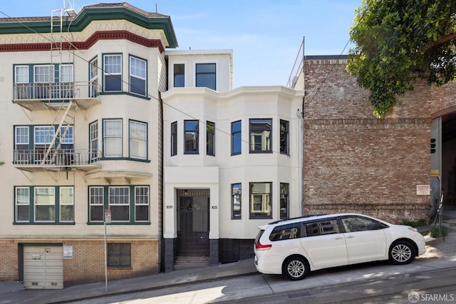 1029 Jackson St Unit 1031, San Francisco, CA 94133 - view of front facade with brick siding and stucco siding