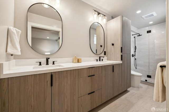 1029 Jackson St Unit 1031, San Francisco, CA 94133 - bathroom with double vanity, a shower stall, toilet, and wood finished floors