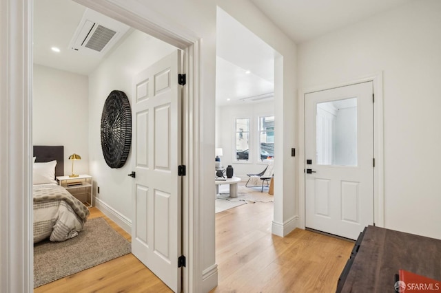 1029 Jackson St Unit 1031, San Francisco, CA 94133 - foyer entrance featuring light wood-style floors, baseboards, and recessed lighting