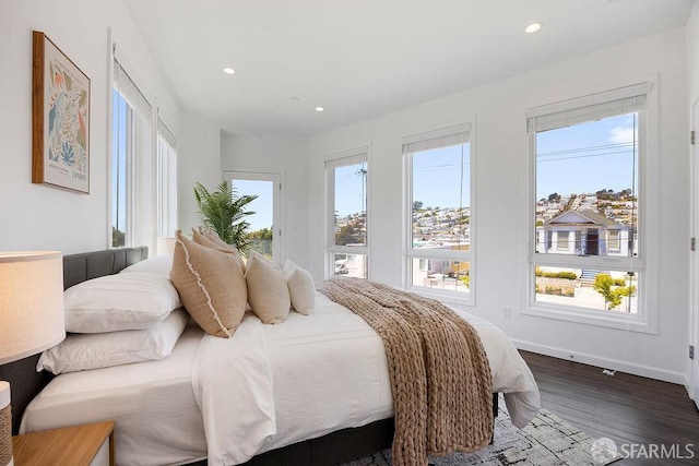 299 Sagamore St, San Francisco, CA 94112 - bedroom with dark wood-type flooring, multiple windows, and recessed lighting