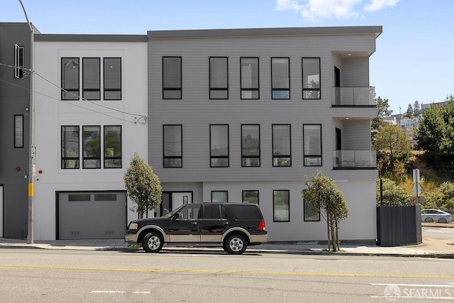 299 Sagamore St, San Francisco, CA 94112 - view of property featuring a garage